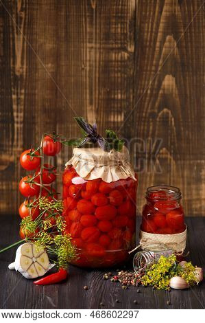 Pickled Cherry Tomatoes With Garlic, Dill And Spices. Homemade Food. Canned Tomatoes In Closed And O
