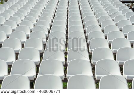 Seats Of Tribune On Sport Stadium. Concept Of Fans, Chairs For Audience, Cultural Environment Concep