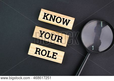 Magnifying Glass And The Words Know Your Role. The Concept Of Self-potential. The Other Wrestler Sho
