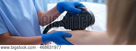 Laser Hair Removal Hair Removal On The Arms In Beauty Salon. Skin Care And Rejuvenation Concept