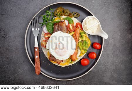 Kebab With Bacon And Fried Egg, Tomato, Spinach, Avocado, Pickled Peppers