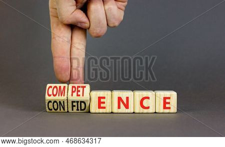 Competence And Confidence Symbol. Concept Word Competence Confidence On Wooden Cubes. Businessman Ha