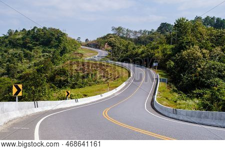 Curved Road In The Mountains Of Nan Thailand, Road Nr 3 In Nan Thailand Country Road