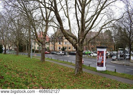 Mainz, Germany - 01 09 2023: Urban Street With A Parking Lot In Background