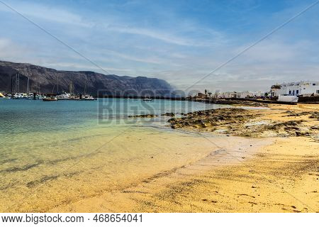 Beach And White Architecture In Caleta Del Sebo, La Graciosa, Canary Islands, Spain