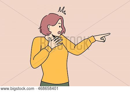 Stunned Young Woman Point To Side Shocked With View Or Element. Amazed Girl Show With Finger Surpris