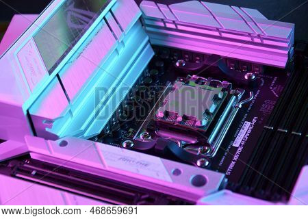 Close-up Of An Amd Ryzen 9 3900X Processor Installed On A Motherboard Asus Rog Strix X670E