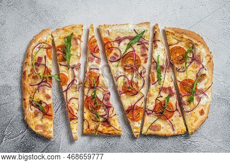 French Tarte Flambee With Cream Cheese, Bacon, Tomato And Onions. Flammkuchen From Alsace Region. Wh