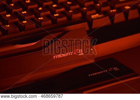 G.skill Ddr5 Trident Z5 Rgb Desktop Memory Pack On Backlit Keyboard Background.