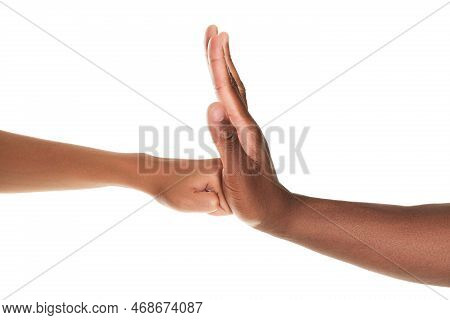 African American Man Stopping Woman's Fist On White Background, Closeup. Antiracism Concept