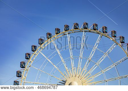 Ferris Wheel In Stuttgart City Under Blue Sky