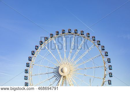 Ferris Wheel In Stuttgart City Under Blue Sky