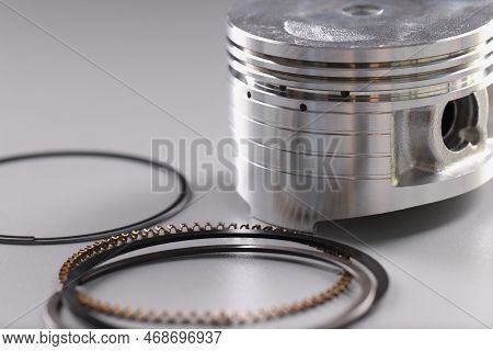 Spare Part Engine Piston And Rings For Auto Repair. Component Engine Repair Concept