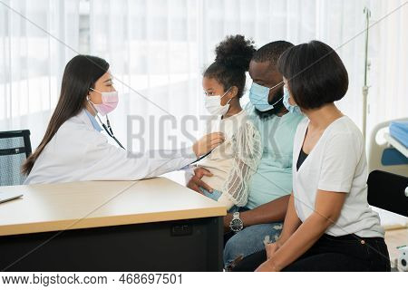 Asian Woman Pediatrician Doctor Hold Stethoscope For Exam A Little Girl Patient And Heck Heart Lungs