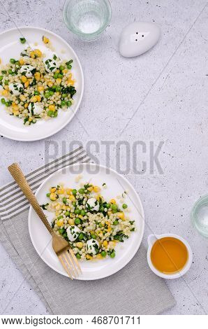 Salad Of Vegetables, Pasta And Mozzarella In A Dish On A Light Background. Top View.
