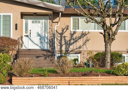 Door Steps And Main Entrance Door Of Residential House In December