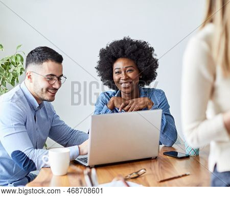 Portrait Of Young African American Businesswoman In The Office Or In School Education With Friends L