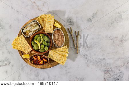 Tinned Fish Board, Variety Of Different Seafood In Conservas. Mediterranean Appetizer Platter With C