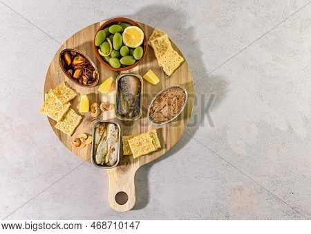 Tinned Fish Board, Variety Of Different Seafood In Conservas. Mediterranean Appetizer Platter With C