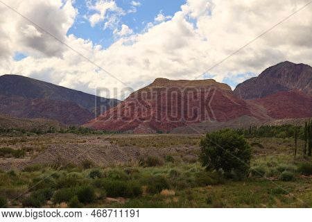 The Colorful Mountain Pollera Coya In The Province Of Jujuy, Argentina. High Quality Photo