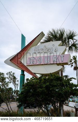 Vilano Beach, Florida - December 29, 2022: Retro Neon Sign For Haleys Court Motel On An Overcast Day
