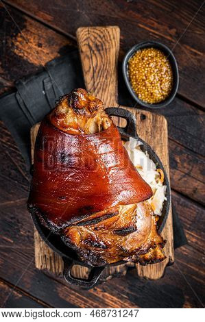 Bavarian Schweinshaxe Roast Pork Hock Ham, Knuckle With Sauerkraut. Wooden Background. Top View