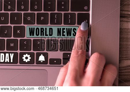 Text Sign Showing World News. Internet Concept Global Noteworthy Information About Recent Or Importa