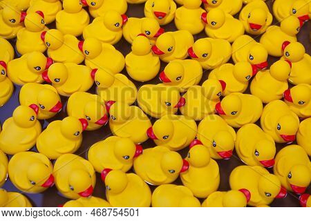 Lot Of Floating Yellow Rubber Ducks -toy Design. Team Work Together. Bath Toy Background -meeting. C