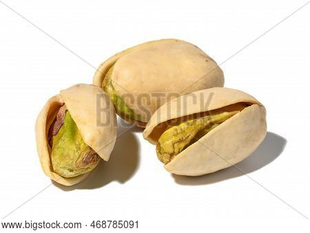 Salted Open Inshell Pistachios Isolated On A White Background, Tasty And Healthy Snack, Close Up