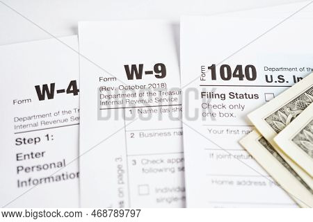 Tax Form, Business Finance With Us Banknotes Concept.