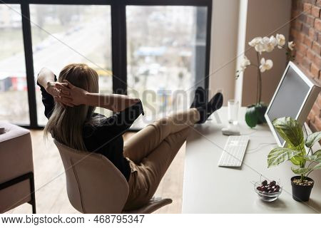 Successful Female Grapic Designer Watching Tutorial About Creative Ideas At Computer During Working 