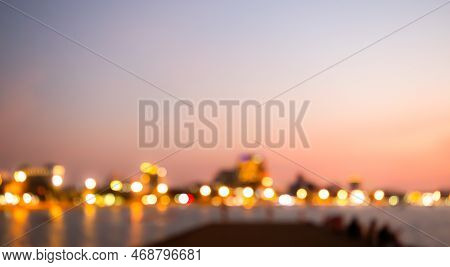 Bokeh Of Blur Night Light City Background,abstract View Skyline Travel Ciryscape Illuminated, Golden