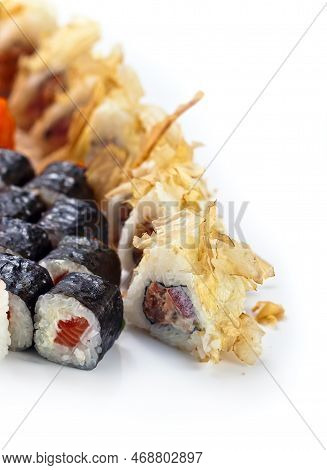 Japanese Sushi Is Isolated On A White Background.