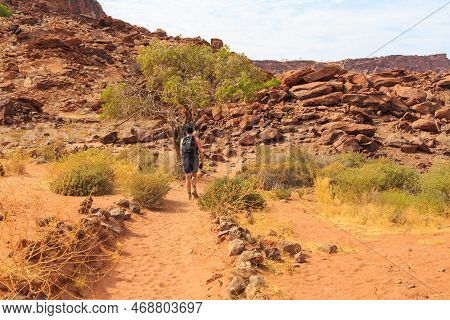 Twyfelfontein, Damaraland, Namibia - 05 October 2018: Tourists In Twyfelfontein, Site Of Ancient Roc