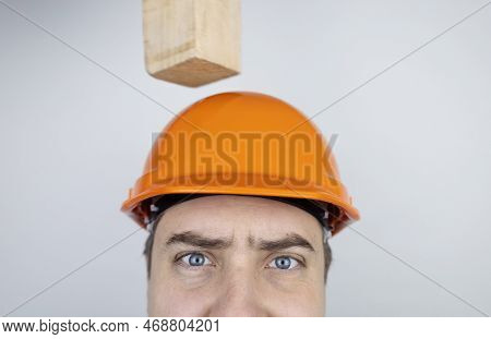Safety Helmet. Brick And A Board Fall On Builder Head. Saving A Life Due To Wearing A Protective Con