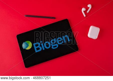 Tula, Russia - October 19, 2021: Biogen Displayed Modern Laptop On Red Background