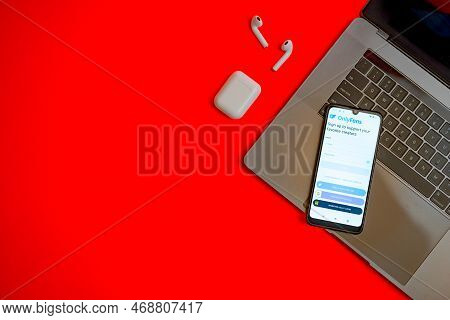 Tula, Russia - November 19, 2021:onlyfans Sign In Web Page Displayed On A Smartphone Near Modern Lap