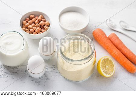 Ingredients For Sweet Carrot Semolina Pie Or Mannik With Nuts: Semolina, Natural Yogurt, Carrots, Ha
