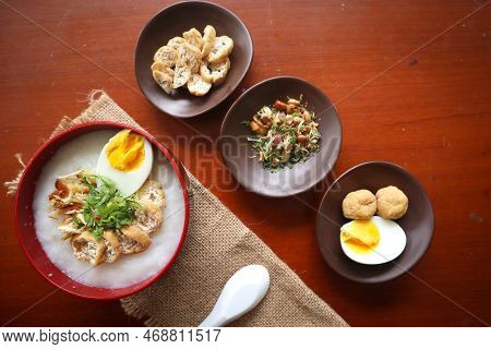 Congee Porridge With Chicken Slice, Tofu, Egg. Congee Porridge From Hong Kong. Chinese Food