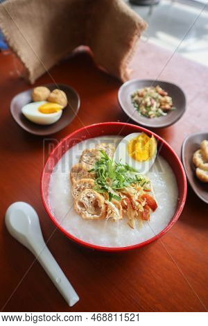 Congee Porridge With Chicken Slice, Tofu, Egg. Congee Porridge From Hong Kong. Chinese Food