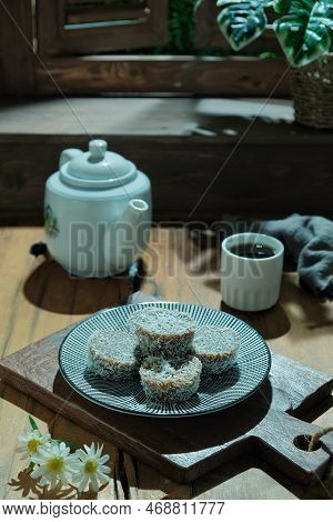 Steamed Rice Cake Or Locally Known As Kuih Lompang Or Kuih Kasui With Desiccated Coconut On Top. Sel