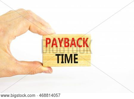 Payback Time Symbol. Concept Words Payback Time On Wooden Blocks. Beautiful White Table White Backgr