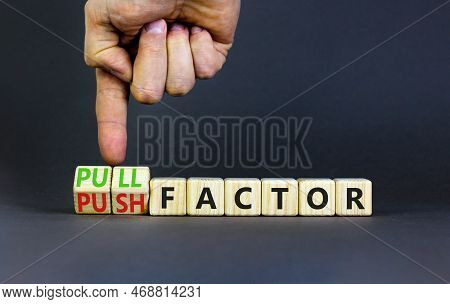 Pull Or Push Factor Symbol. Concept Word Pull Factor And Push Factor On Wooden Cubes. Beautiful Grey