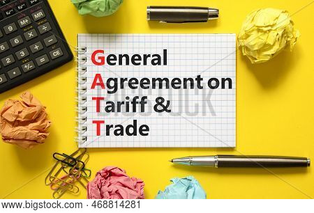 Gatt Symbol. Concept Words Gatt General Agreement On Tariff And Trade On White Note On Beautiful Yel