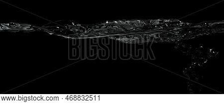 Liquid Suface Line Between Underwater And Above Water With Black Background.