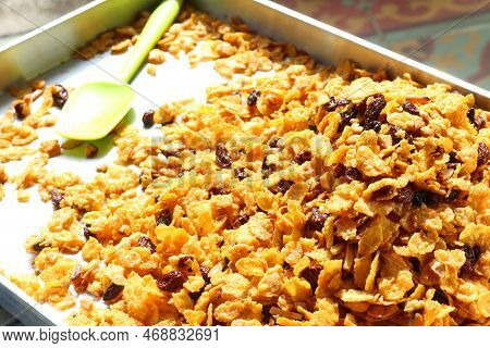 Caramel Cornflake With Raisins And Cashew Nut In The Tray