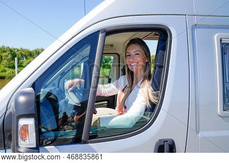 Beautiful Smiling Woman In Rv Camper Van During Travel Motor Home Camping Car In Vanlife