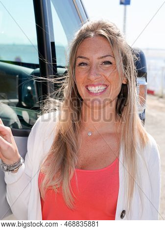 Young Woman Aside Camper Van Smiling Enjoy Van And Vanlife Freedom