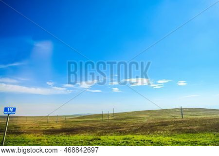 Typical Landscape Of Taman Peninsula In Krasnodar Region, Russia. Green Steppe Hill At A Bright Sunn