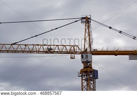 Low Angle View Of Crane Against Sky